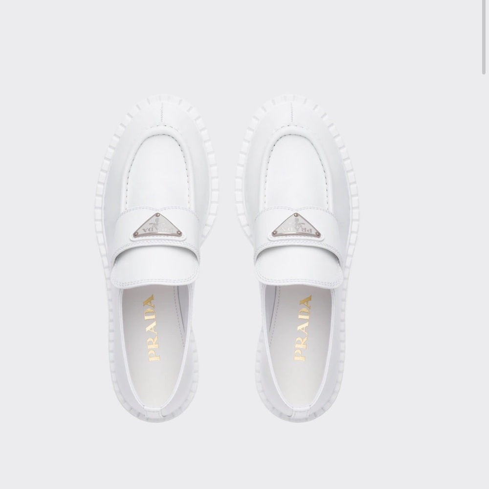 Prada White Leather Penny Loafers with Silver Logo